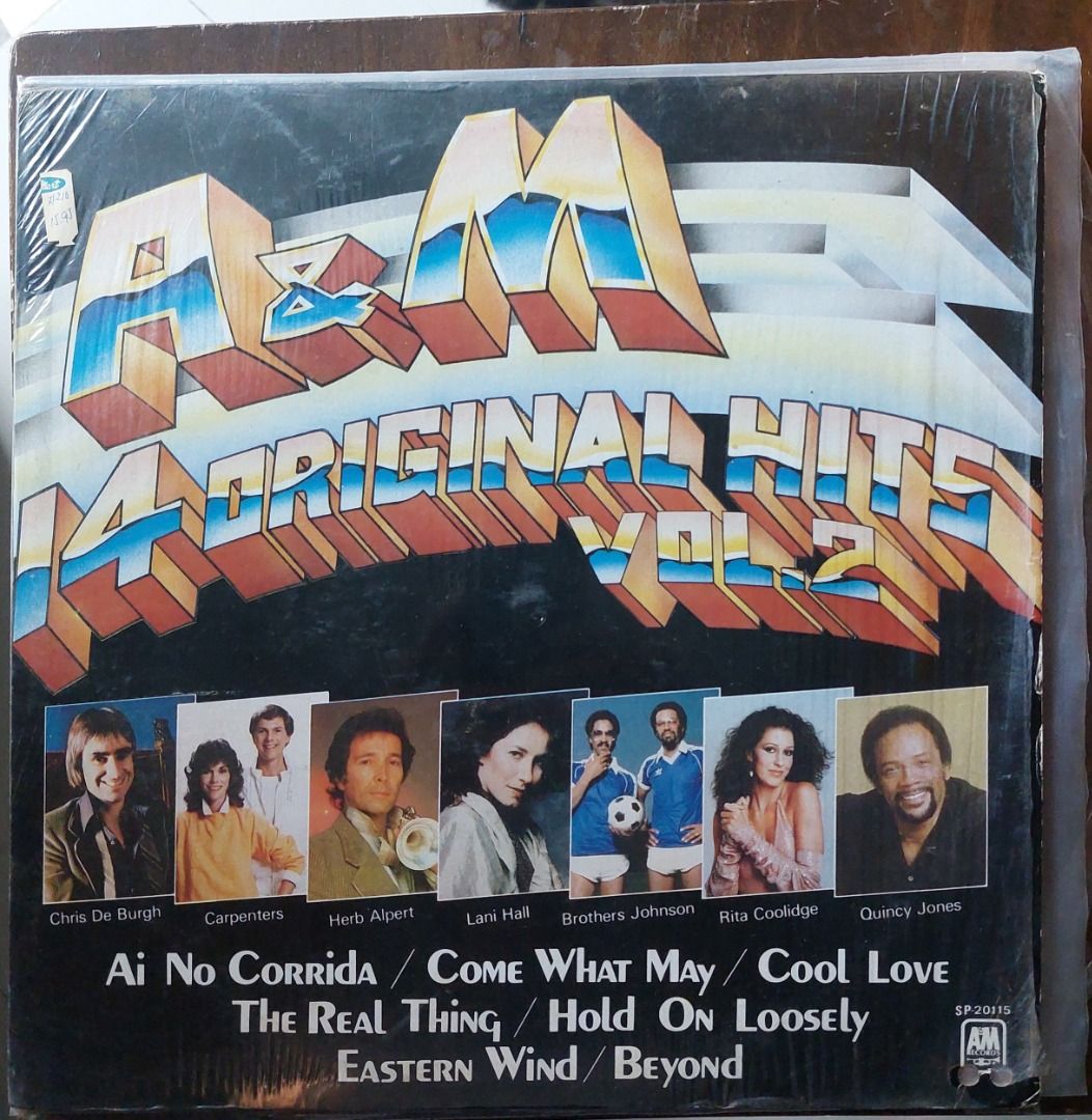 A&M 14 Original Hits Vol. 2 Vinyl LP (Category: Vinyls) located in Quezon City. Submitted by safefish_95f205 (Listing ID 1471296528, Image 1). Description: - Compilation album from A&M Records (Catalog # SP-20115) - Features tracks by legendary artists like Quincy Jones, The Carpenters, Chris De Burgh, and Herb Alpert - Includes original inner sleeve and vinyl record - Outer jacket comes with plastic shrink wrap still intact.