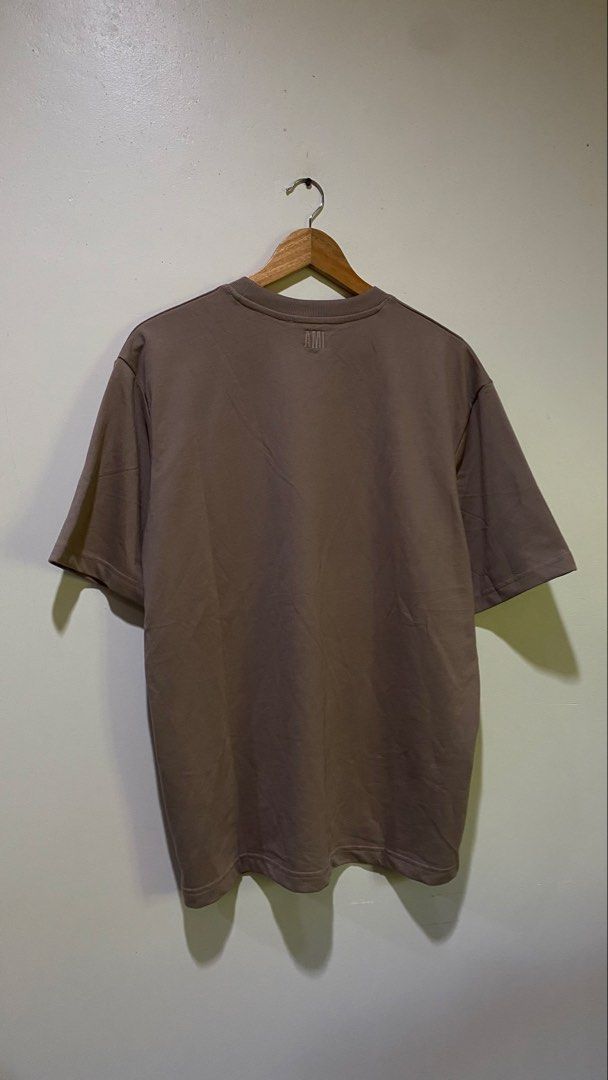 Ami t shirt (Category: Coats, Jackets and Outerwear) located in Nagcarlan. Submitted by nsh.c (Listing ID 1471137910, Image 2). Description: Excellent condition Cr:10/10 Dimes:28X23 Super ganda neto lalo sa personal.