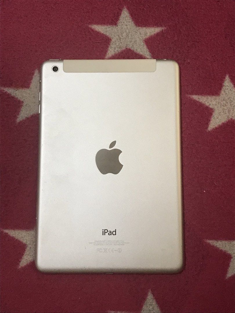 Apple iPad Mini – White/Silver (Category: iPad) located in Pagadian. Submitted by cassiopeia.aphrodite458 (Listing ID 1471180724, Image 3). Description: 📱 Original Apple iPad Mini 🤍 White front / Silver back 📷 With front and rear camera 📶 SIM card slot 🔋 Turns on and displays the lock screen Condition: * With visible vertical colored lines on the left side of the screen. * LCD/display is damaged and may need replacement. * With minor signs o