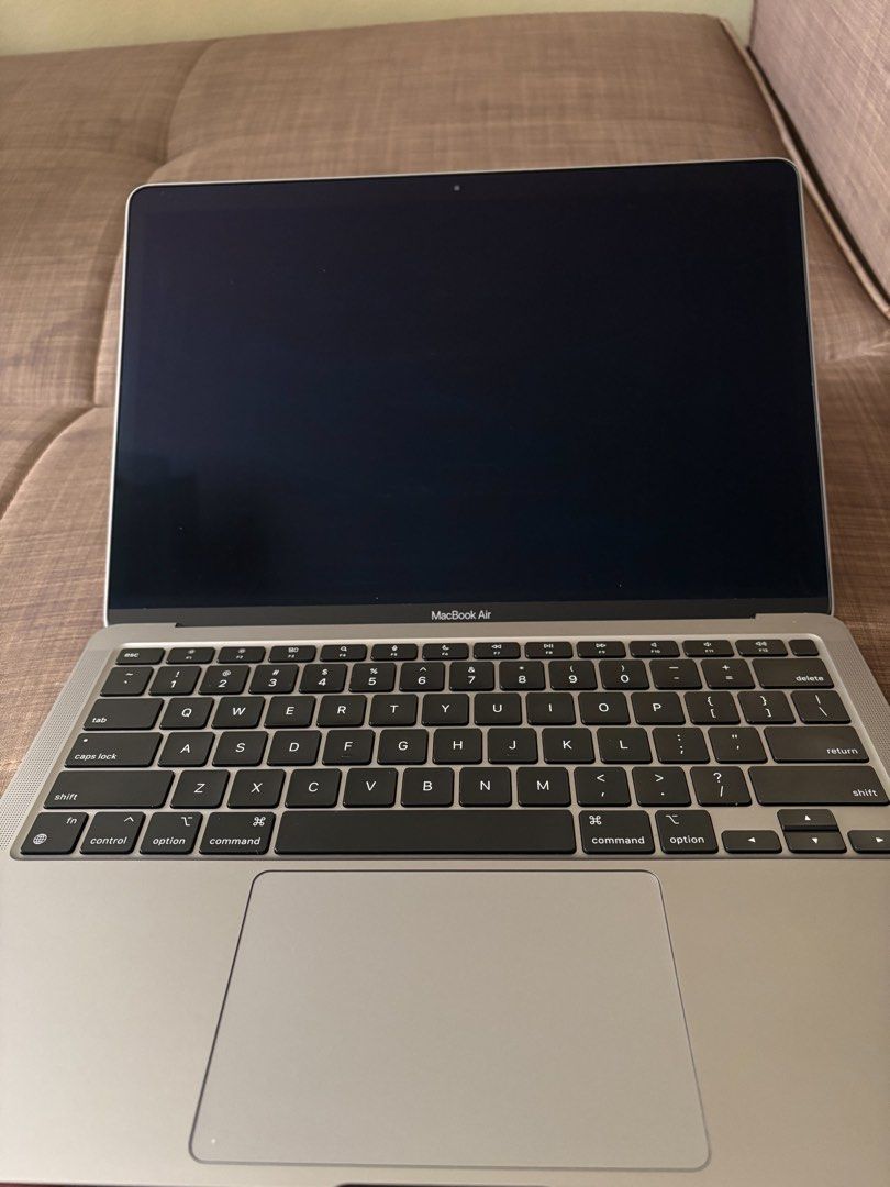 Apple MacBook Air 13-inch M1 (Category: Laptops & Notebooks) located in Paniqui. Submitted by kim97 (Listing ID 1471159061, Image 3). Description: - Model: Apple MacBook Air (Model A2337) - Color: Space gray - Condition: Excellent, fully functional with clean screen and bottom panel - Features: Full keyboard layout, large trackpad, and clear display showing desktop - Details: All four rubber feet intact, serial number visible near hinge - RFS: Up