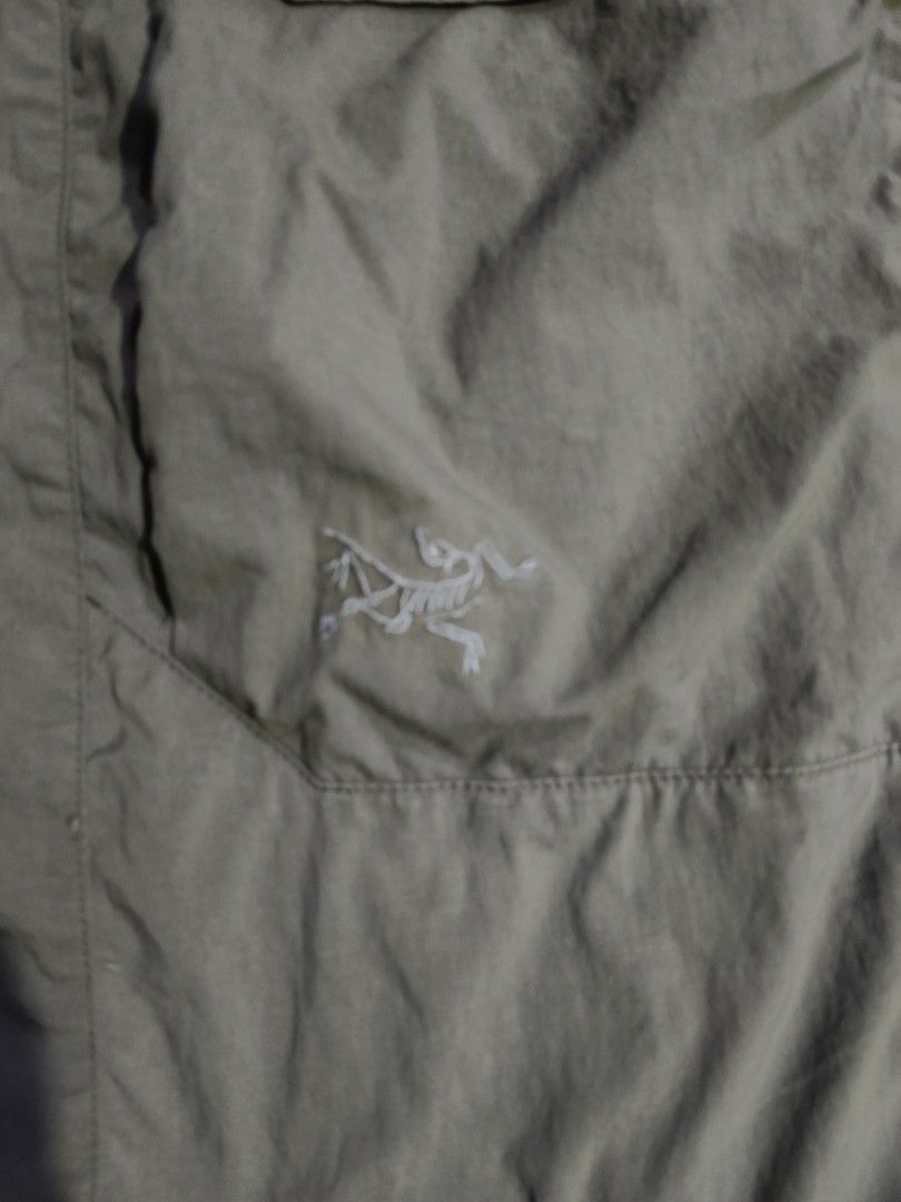 Arc'teryx Olive Green Nylon Cargo Hiking Pants (Category: Joggers) located in General Santos City (Dadiangas). Submitted by freehorse.5f2a61 (Listing ID 1471224735, Image 3). Description: - Brand: Arc'teryx - Color: Olive Green - Material: 94% nylon, 6% elastane (durable & stretchy) - Features: Side cargo pockets, embroidered Arc'teryx logo - Best for: Hiking, camping, and outdoor adventures - Care: Machine washable (do not use fabric softener) W