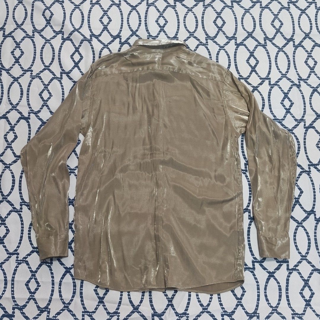 Armani Exchange lightbrown silk button up longsleeve (Category: Formal Shirts) located in General Trias. Submitted by tyoc_82706 (Listing ID 1471206558, Image 2). Description: Sleeves: 24 inches ‎Length: 30 inches ‎Width: 20 inches ‎Issue: missing 3rd button.