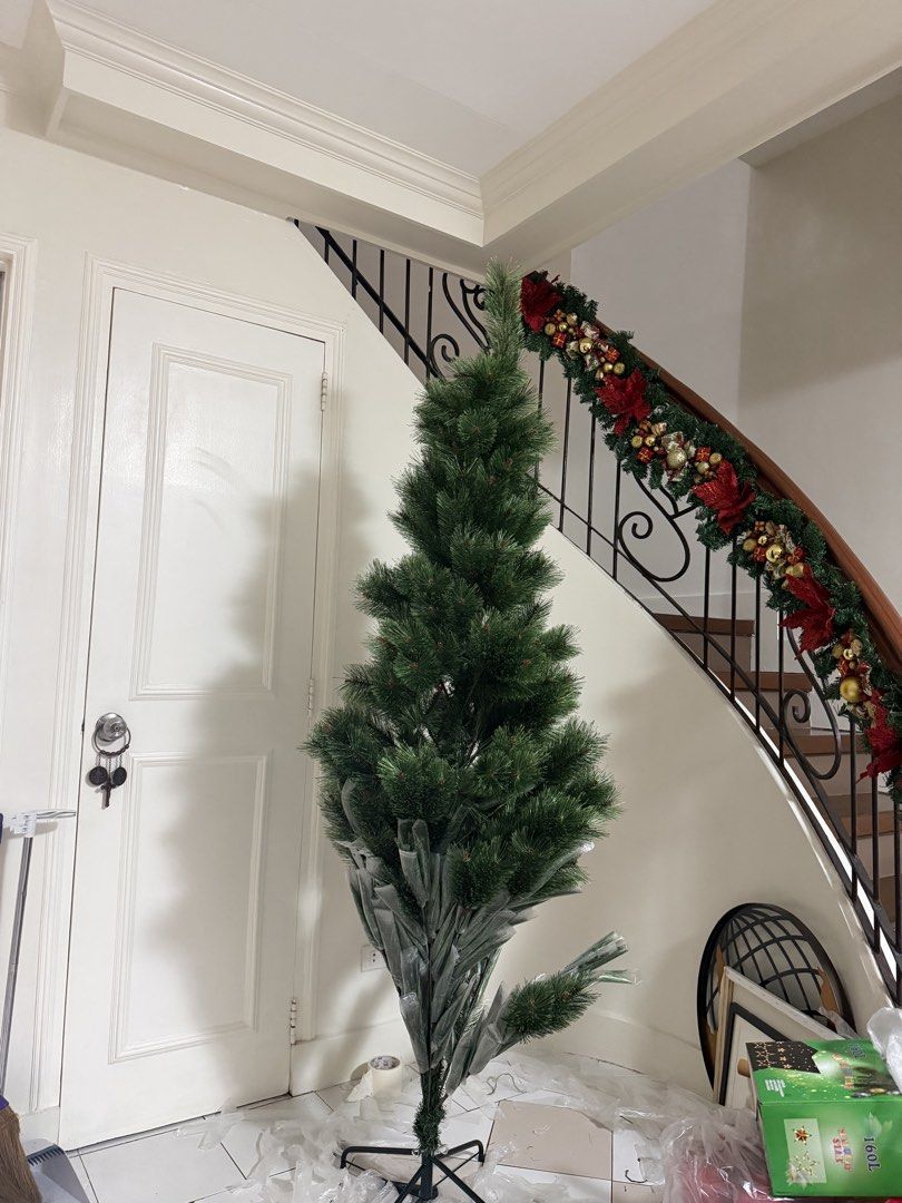 Artificial Christmas Tree with Stand (Category: Artificial Plants & Flowers) located in Pasig City. Submitted by igotfat (Listing ID 1471139664, Image 1). Description: Brand new Maliit pala dapat 8 feet ang nabili Selling low for 2.5k.