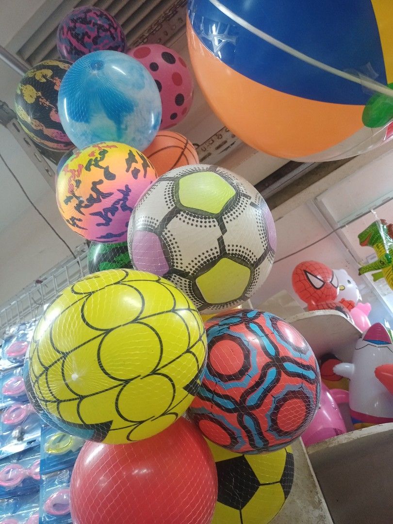 Assorted Inflatable Beach Balls and Playground Balls (Category: Kids Toys) located in Manila. Submitted by oddocean.ee74c3 (Listing ID 1471155653, Image 1). Description: - Vibrant inflatable beach and playground balls - Available designs: soccer patterns, tie-dye, bright stripes, and cartoon prints - Perfect for outdoor games, pool parties, and beach trips - Price is per piece (sold individually) - Kindly message me your preferred design first be
