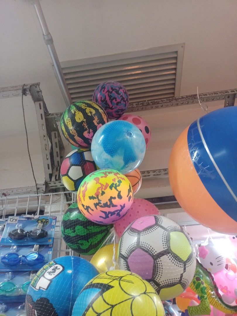 Assorted Inflatable Beach Balls and Playground Balls (Category: Kids Toys) located in Manila. Submitted by oddocean.ee74c3 (Listing ID 1471155653, Image 2). Description: - Vibrant inflatable beach and playground balls - Available designs: soccer patterns, tie-dye, bright stripes, and cartoon prints - Perfect for outdoor games, pool parties, and beach trips - Price is per piece (sold individually) - Kindly message me your preferred design first be