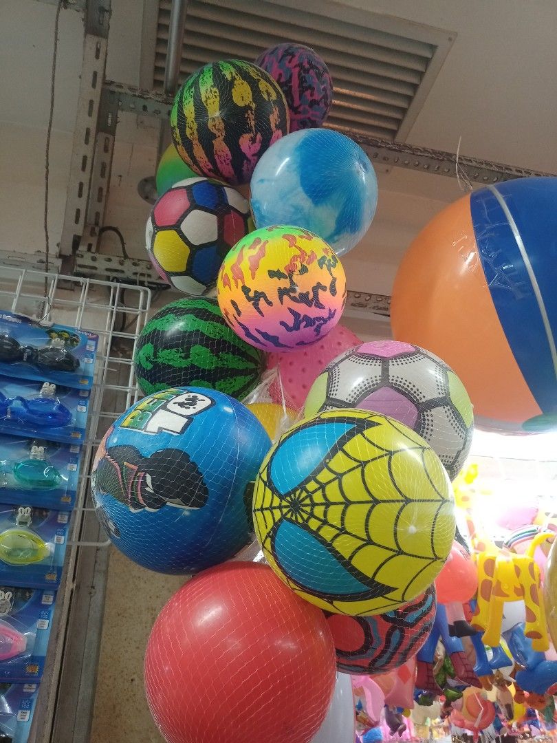 Assorted Inflatable Beach Balls and Playground Balls (Category: Kids Toys) located in Manila. Submitted by oddocean.ee74c3 (Listing ID 1471155653, Image 3). Description: - Vibrant inflatable beach and playground balls - Available designs: soccer patterns, tie-dye, bright stripes, and cartoon prints - Perfect for outdoor games, pool parties, and beach trips - Price is per piece (sold individually) - Kindly message me your preferred design first be