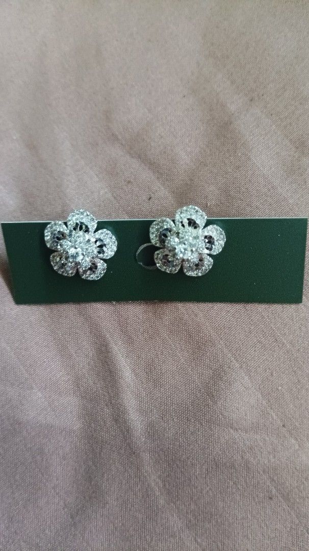 Assorted Rhinestone Stud Earrings Set (Category: Earrings) located in Manila. Submitted by princessfarrah_30 (Listing ID 1471136086, Image 3). Description: - Set of 5 gorgeous pairs of statement earrings - Features emerald-cut green stones, dark violet rectangles, floral rhinestone halos, and curved pavé hoops - Silver-tone metal settings with sparkling crystal details - Versatile styles ranging from dainty to bold - Perfect for both everyday wea