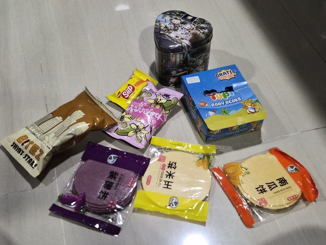 Assorted Snacks Bundle (Category: Packaged & Instant Food) located in Singapore. Submitted by thy_sanctuary (Listing ID 1471271455, Image 1). Description: - Big Country butter cookies in a heart-shaped teddy bear music box tin - a mix of snacks - some halal, some unsure..
