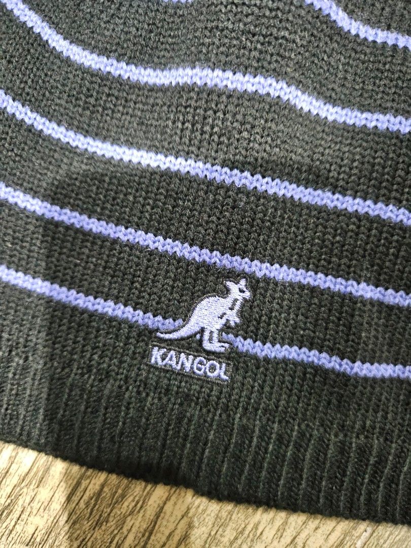 Authentic Kangol Knit Beanie Hat (Black / Purple) (Category: Hats & Beanies) located in Pasay City. Submitted by pass.it.on.ph (Listing ID 1471203337, Image 2). Description: ​✨ Brand New With Tags (BNWT) – Authentic Kangol beanie featuring the classic embroidered Kangaroo logo! ​Brand: Kangol (Blue Line Series) ​Style / Code: 6710BC ​Colorway: Black with Purple/Lavender stripes ​Size: One Size Fits All (OS) ​Material: 100% Acrylic (Soft knit & co