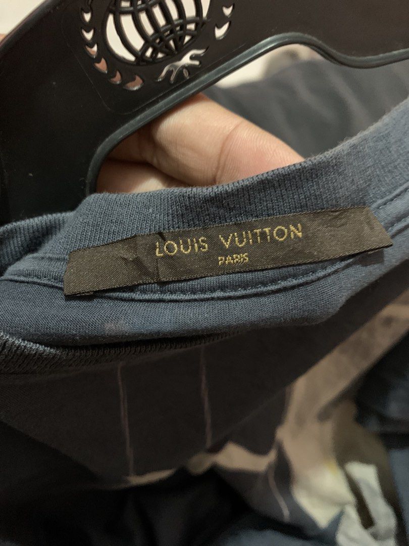 Authentic LV scaffolding man (Category: Luxury Apparel) located in Davao. Submitted by frnzy05 (Listing ID 1471172108, Image 2). Description: LV scaffolding man Size - Large on tag Width - 22.5 Length - 28 Issues - yellow stain and need wash Color rate - 9/10 Condition - still very good Claim - 2499 + sf negotiable .