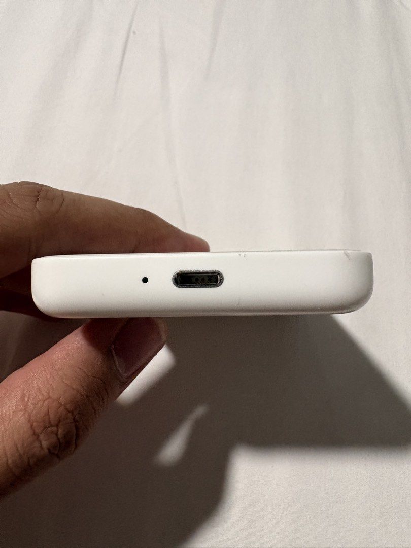 Authentic original apple magsafe powerbank (Category: Batteries & Power Banks) located in Manila. Submitted by safeeagle-776d16 (Listing ID 1471242098, Image 3). Description: issues: scratch on the back charger: lighting cable working well shipping fee will be shouldered by the buyer.