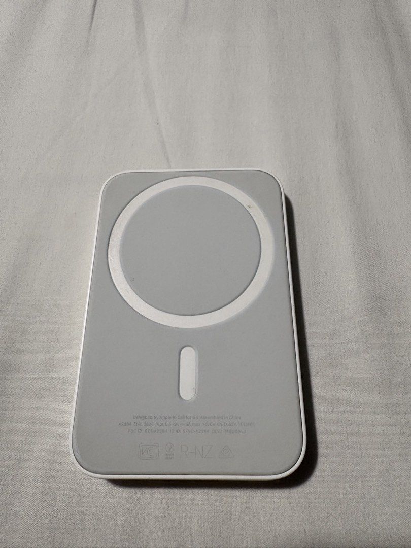 Authentic original apple magsafe powerbank (Category: Batteries & Power Banks) located in Manila. Submitted by safeeagle-776d16 (Listing ID 1471242098, Image 2). Description: issues: scratch on the back charger: lighting cable working well shipping fee will be shouldered by the buyer.