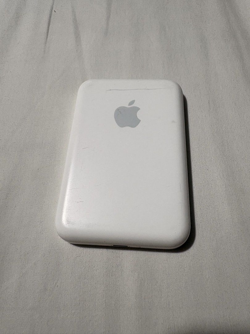 Authentic original apple magsafe powerbank (Category: Batteries & Power Banks) located in Manila. Submitted by safeeagle-776d16 (Listing ID 1471242098, Image 1). Description: issues: scratch on the back charger: lighting cable working well shipping fee will be shouldered by the buyer.