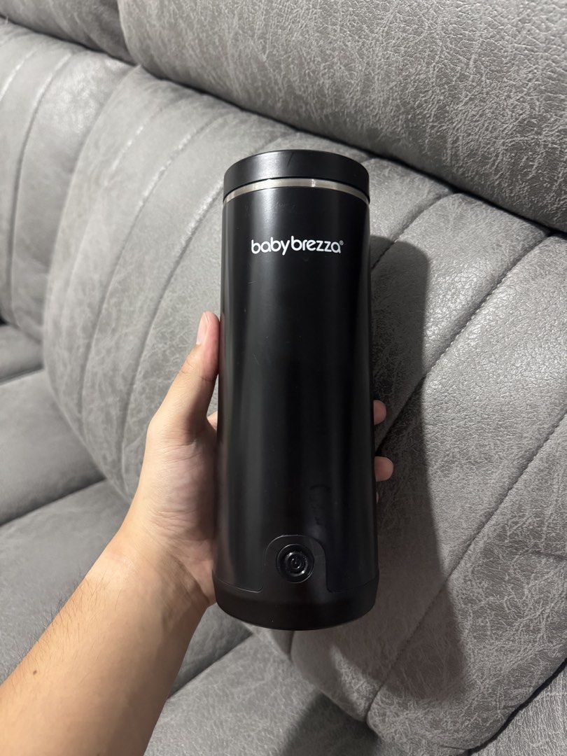 Baby Brezza Superfast Portable Bottle Warmer (Category: Breastfeeding & Bottle Feeding) located in Quezon City. Submitted by garagesalefinds (Listing ID 1471227228, Image 1). Description: Bought it in rustans Never used No issue.