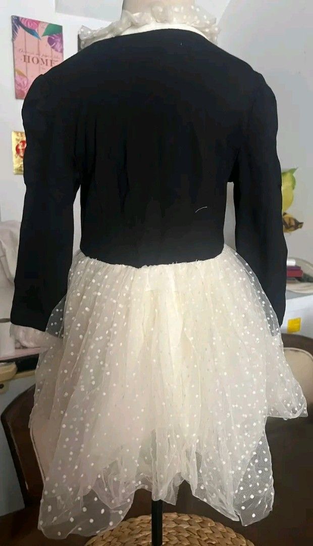 Baby dress (Category: Babies & Kids Fashion) located in Manila. Submitted by rubymielbona (Listing ID 1471222990, Image 3). Description: - Brand: Richie House (Model RH2076) - Color: Black and Beige - Size: 2-3 years - Material/Design: Black knit long-sleeve top with white button placket and cute bow collar - Skirt: Fluffy layered mesh skirt with white polka dots - Condition: Excellent, well-maintained ✨👑 Elegant Princess Dress 👑✨ 🌸 Brandnew �