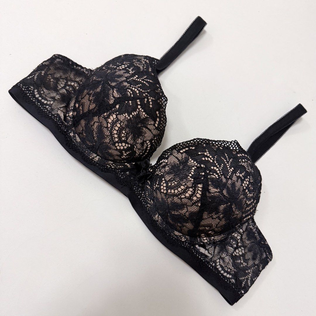 Black Floral Lace Underwire Push-up Bra [34A] (Category: Undergarments & Loungewear) located in Malabon City. Submitted by k_intimates (Listing ID 1471287320, Image 3). Description: Details: • Size 34A / wired / graduated push-up • Like new (fave! super nice ng lift I swear and design is too pretty similar with vs 🩷) • Black lace push-up bra featuring a floral pattern overlay, underwire support, and a center bow detail..