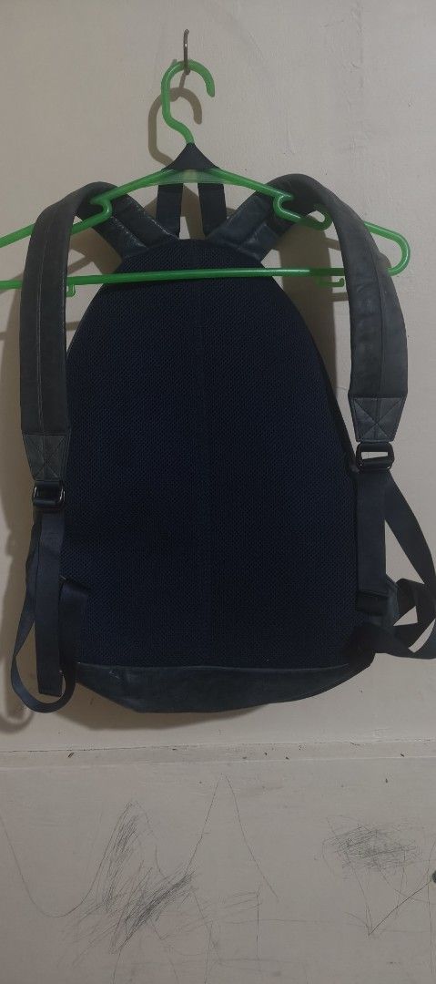 Black leather backpack Japan porter (Category: Backpacks) located in Caloocan City. Submitted by abykilo99-61094 (Listing ID 1471285762, Image 3). Description: - Material: Soft tumbled leather with natural creases and wear lines for a stylish lived-in look nego - Compartments: Secure main zip compartment opening at the top plus a neg convenient front zipper pocket - Comfort: Adjustable shoulder straps featuring padded mesh backing for all-day car