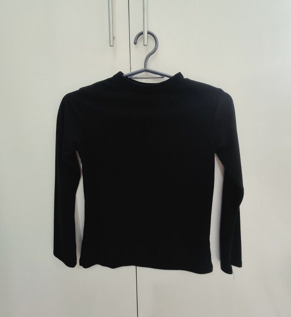 Black long sleeve and button top bundle (Category: Longsleeves) located in Angeles City. Submitted by cloudzies041456 (Listing ID 1471129588, Image 2). Description: - Bundle of 2 solid black basic tops - Top 1: Defacto scoop neck with front button placket and 3/4 sleeves - Top 2: Classic long sleeve fitted top with a mock neck collar - Easy to mix and match with jeans, skirts, and more - Wardrobe essentials for everyday wear.