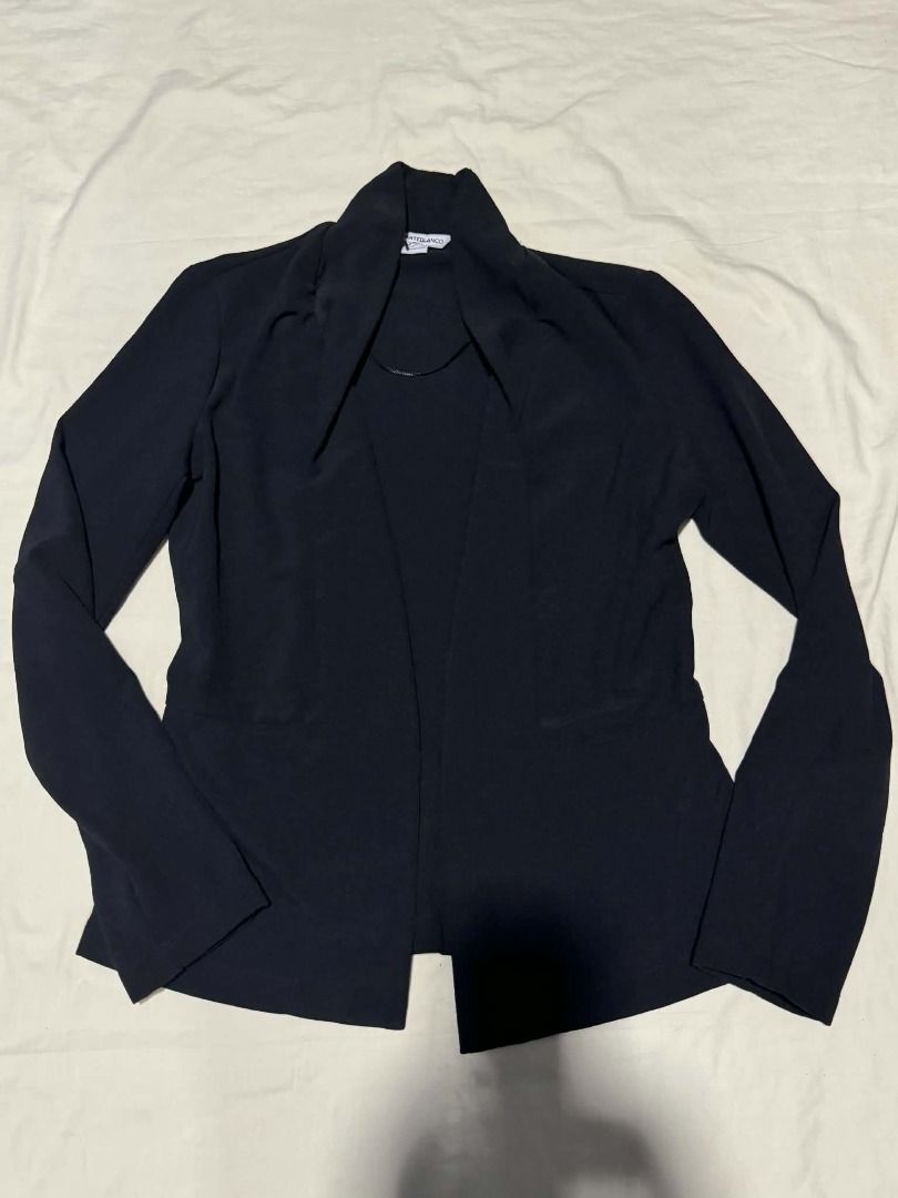 Black Long Sleeve Open Cardigan Blazer Jacket (Category: Coats, Jackets and Outerwear) located in Caloocan City. Submitted by deo0215 (Listing ID 1471134345, Image 3). Description: - Color: Black - Style: Open-front cardigan jacket with draped collar - Sleeves: Long sleeves - Fabric: Lightweight and smooth - Fit: Structured silhouette - Occasion: Ideal for workwear or casual layering.