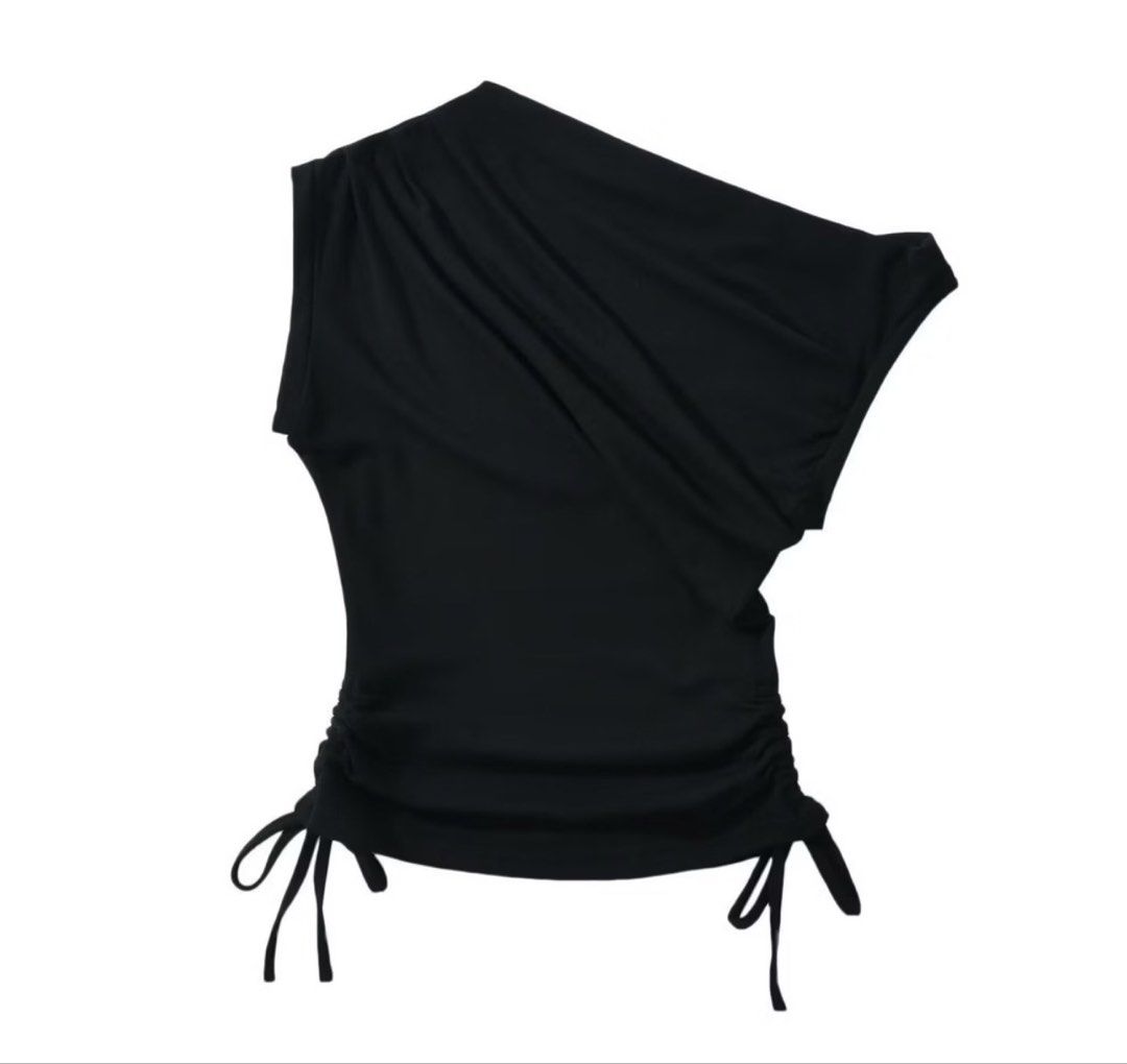 Black One-Shoulder Asymmetrical Ruched Top with Drawstring Sides (Category: Sleeveless) located in San Juan City. Submitted by declutterwithxz (Listing ID 1471166040, Image 1). Description: - Color: Black - Design: One-shoulder with asymmetrical neckline and draped chest - Fit: Slim fit with stretchy, comfortable material - Feature: Adjustable drawstrings on both sides for custom ruching - Styling: Pairs easily with jeans, shorts, or skirts.