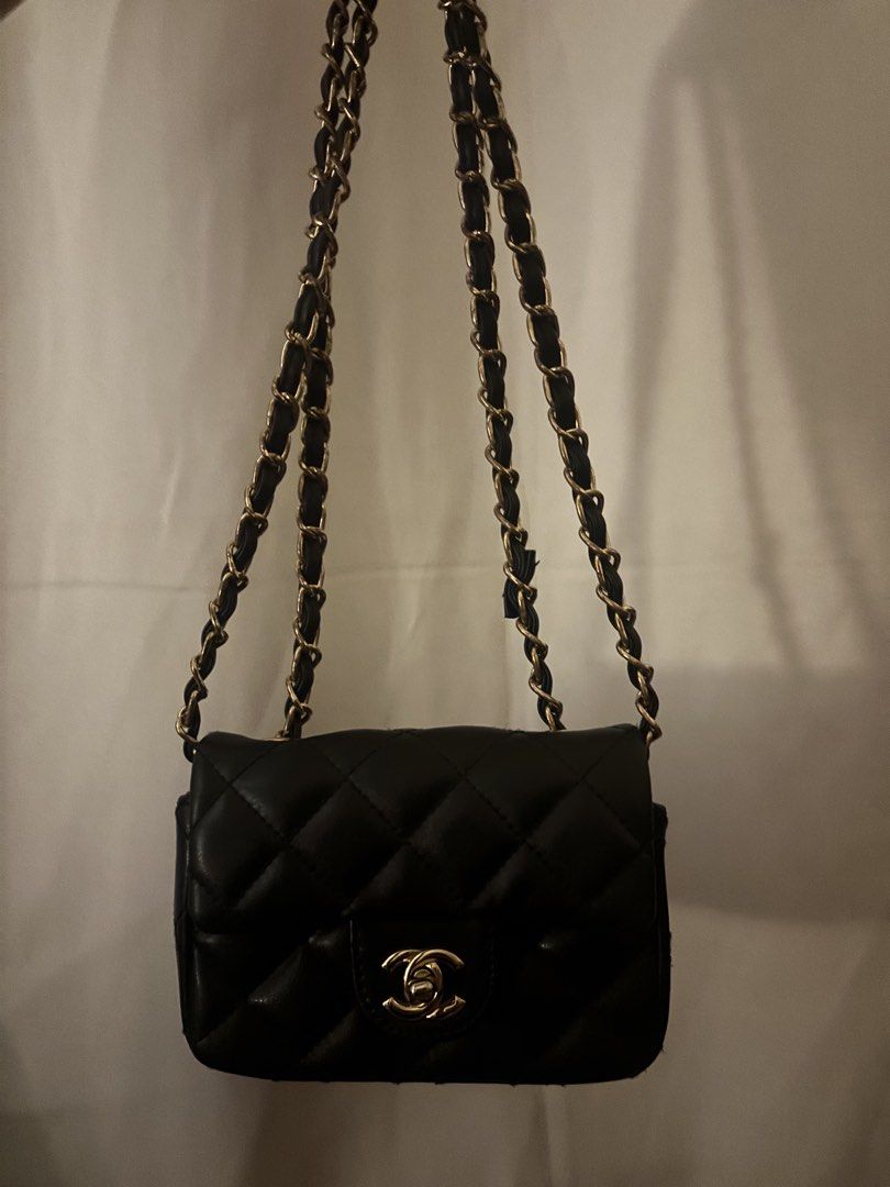 Black Quilted Leather Chain Shoulder Bag chanel (Category: Shoulder Bags) located in Las Pinas. Submitted by bellagvr (Listing ID 1471142991, Image 1). Description: - Color & Material: Black quilted leather - Hardware: Gold-tone - Strap: Chain interlaced with black leather - Closure: Classic flap with interlocking CC turn-lock - Size: Compact and structured, ideal for daily essentials - Style: Versatile design that matches any outfit.