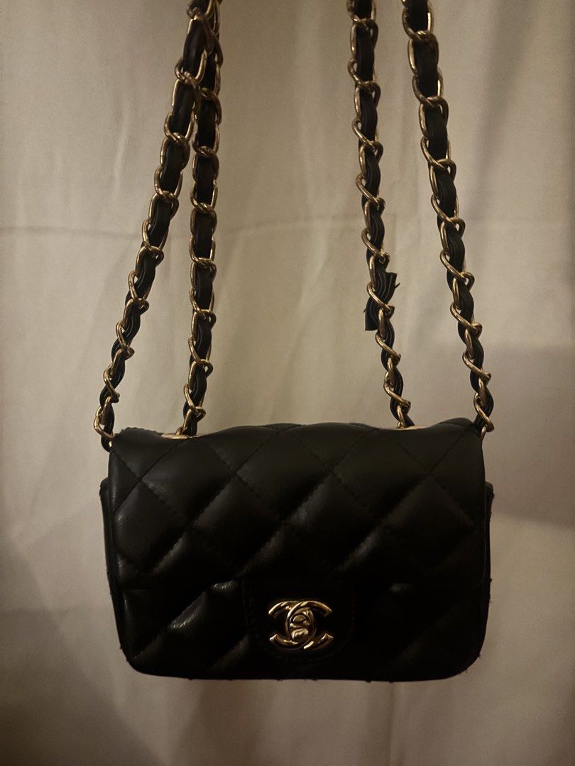 Black Quilted Leather Chain Shoulder Bag chanel (Category: Shoulder Bags) located in Las Pinas. Submitted by bellagvr (Listing ID 1471142991, Image 2). Description: - Color & Material: Black quilted leather - Hardware: Gold-tone - Strap: Chain interlaced with black leather - Closure: Classic flap with interlocking CC turn-lock - Size: Compact and structured, ideal for daily essentials - Style: Versatile design that matches any outfit.