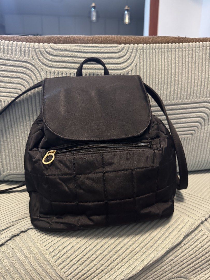 Black Quilted Nylon Mini Backpack with Gold Hardware (Category: Backpacks) located in Imus. Submitted by budolfindsimus (Listing ID 1471257361, Image 1). Description: 🖤 Japan Source Quilted Backpack - Minimalist Black! Japan source thrift find 🇯🇵✨ Details: 🖤 Color: Jet black - super classy 🧵 Material: Quilted nylon - light & durable ✨ Gold hardware zipper - sosyal! 🎒 Style: Backpack + may top handle 📐 Size: Medium - kasya daily essentials,