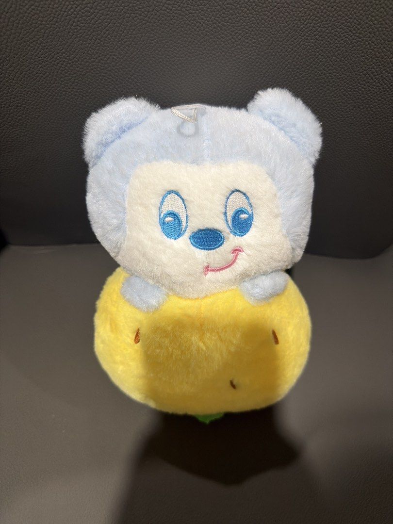 Blue Bear in Yellow Fruit Plush Toy Keychain (Category: Plushies & Soft Toys) located in San Juan City. Submitted by lilminey (Listing ID 1471253260, Image 1). Description: - Adorable blue bear plush character tucked inside a bright yellow fruit - Features embroidered facial details and a friendly smile - Small hanging loop at the top for easy attachment to bags or keys - Made with all-over soft fabric material - Clean exterior with vibrant, eye-