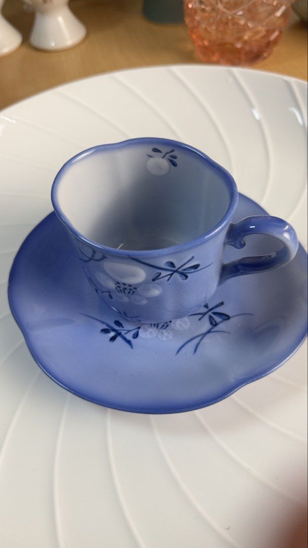 Blue Floral Ceramic Teacup and Saucer Set (Category: Coffee & Tea Tableware) located in Masinloc. Submitted by kristineba02273 (Listing ID 1471150656, Image 3). Description: - Set of 4 blue ceramic teacups with matching saucers - Hand-painted white floral motifs and dark blue linework - Elegant scalloped edges on cups and saucers - Smooth glossy finish - Ideal for morning coffee, afternoon tea, or home display - Selling strictly as a set.
