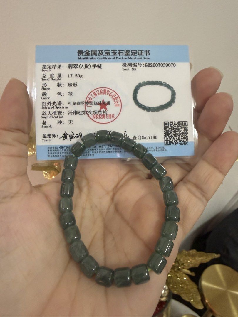Blue Water Jadeite Bracelet (Category: Bracelets) located in Las Pinas. Submitted by fayeabell (Listing ID 1471157398, Image 2). Description: - Genuine blue water jadeite bracelet with natural translucency - Deep green shade with smooth cylindrical beads - Total weight: 17.59g - Strung securely on durable elastic cord for easy wear - Comes with official certificate of authenticity (No. GB2607039070) - Classic and elegant everyday piece.