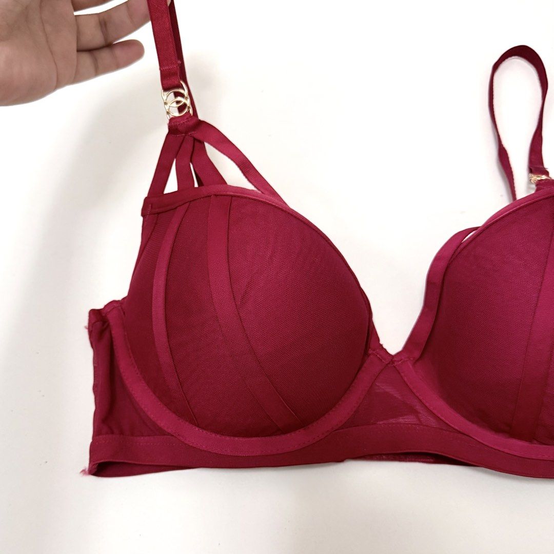BNEW Deep Red Sexy Push-up Bra [34CD] (Category: Undergarments & Loungewear) located in Malabon City. Submitted by k_intimates (Listing ID 1471199427, Image 3). Description: Details: • Size 34CD / wired / graduated push-up • Brandnew • Deep red-colored underwire bra featuring structured paneled cups, sheer mesh wings, and adjustable straps with gold-toned hardware. .