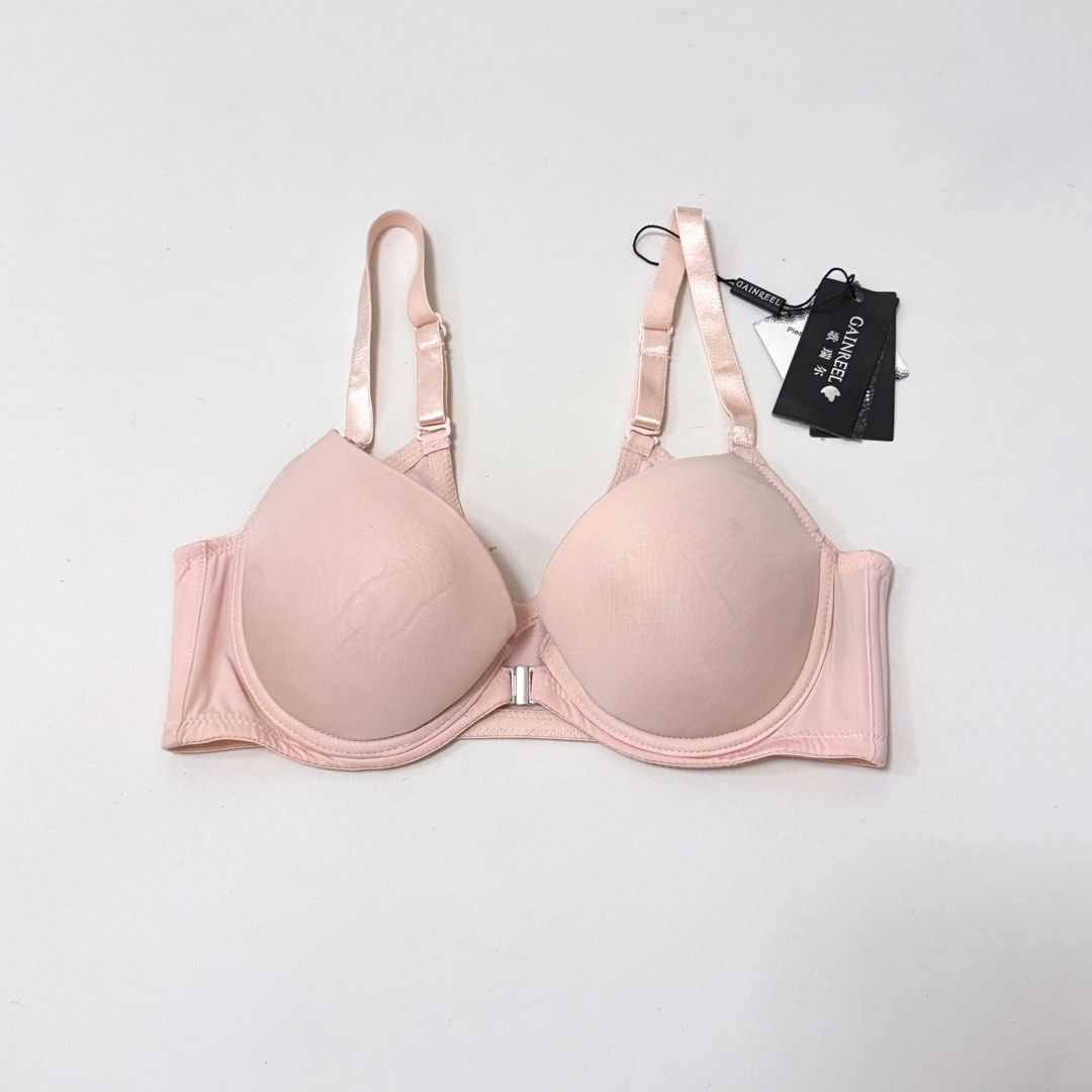 BNEW GAINREEL Light Pink Front-Closure Push-up Bra [34B] (Category: Undergarments & Loungewear) located in Malabon City. Submitted by k_intimates (Listing ID 1471290956, Image 1). Description: Details: • Size 34B / wired / push-up • Bnew, but has minimal dirt/stain on the cup • Light pink push-up bra with a front-closure clasp and adjustable straps..