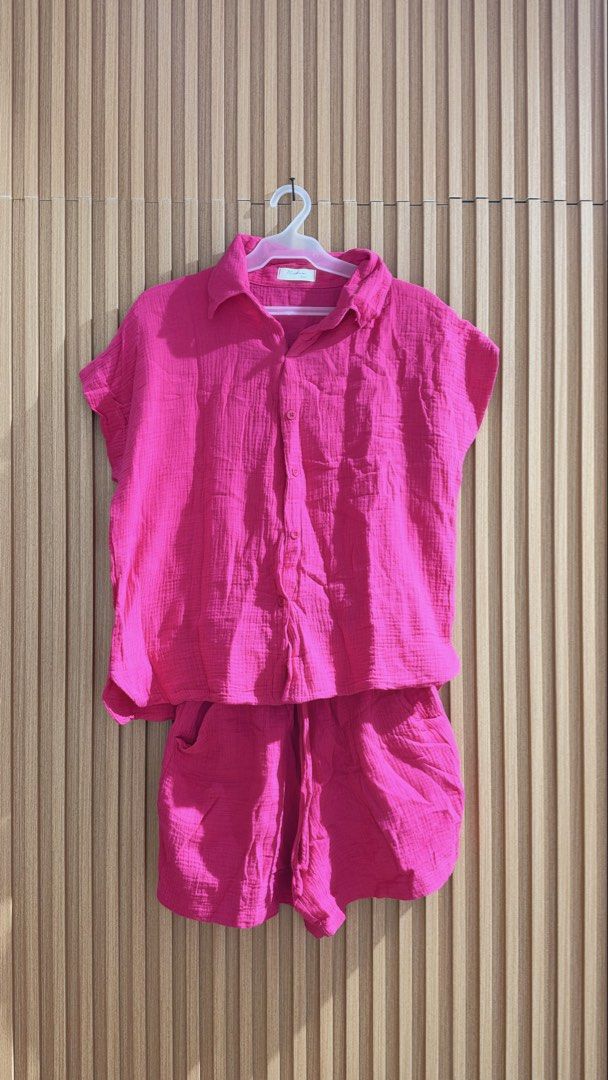 Bright pink Coords (Category: Sets or Coordinates) located in Manila. Submitted by noblestone-f8c154 (Listing ID 1471229288, Image 1). Description: - 2-piece set: Hot pink short-sleeve button-up top and matching shorts .