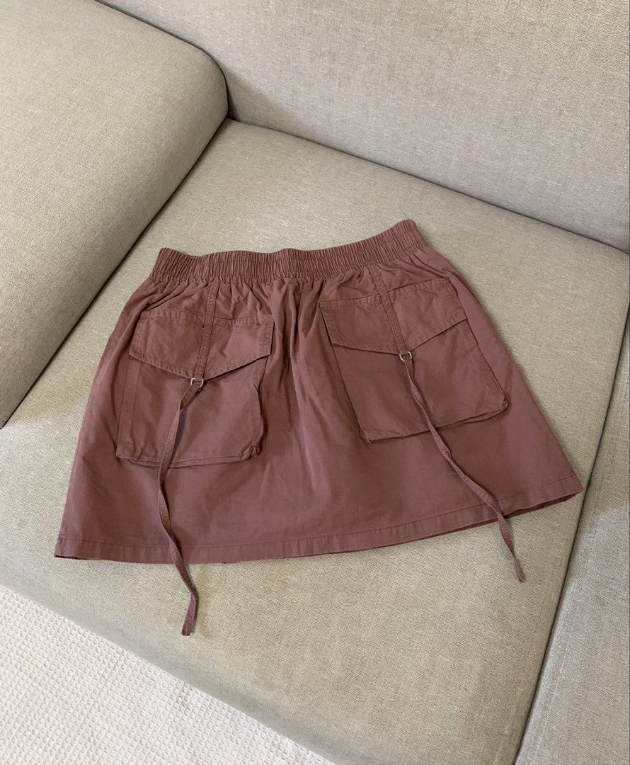 Brown cargo skirt (Category: Skirts) located in Paranaque City. Submitted by shoplovedbya (Listing ID 1471218377, Image 1). Description: ♡ Waist: 26-32 (stretchable) ♡ Length: 13.5 - has inner shorts and front pockets .