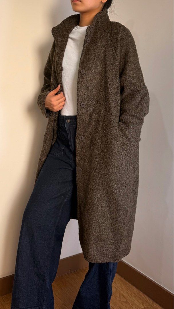 Brown Wool Blend Oversized Winter Long Coat (Category: Coats, Jackets and Outerwear) located in Quezon City. Submitted by cristealyanna (Listing ID 1471140097, Image 1). Description: - Color: Brown - Material: Textured wool - Length: Mid-calf - Fit: Relaxed - Features: High collar, front buttons, deep side pockets - Style: Versatile layering piece for chilly weather.