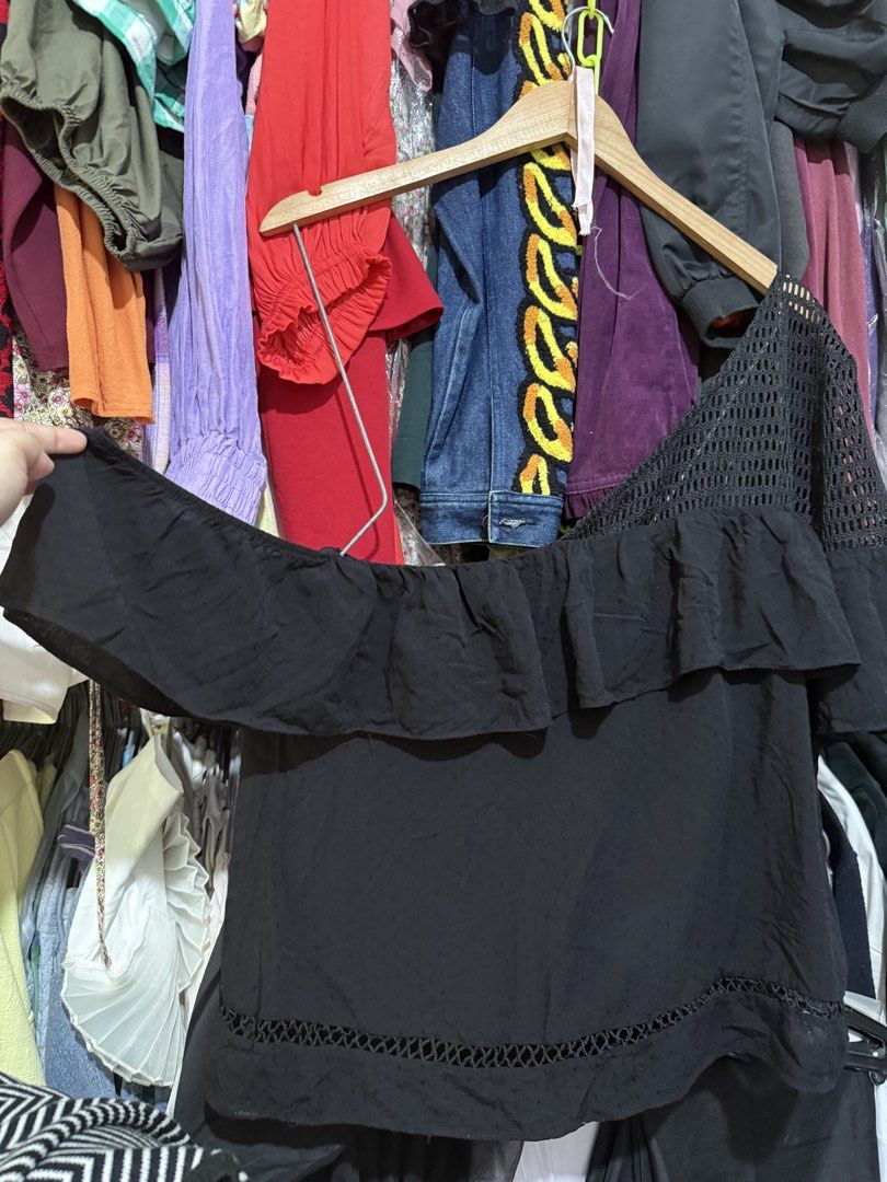 Buffalo by David Bitton Black off shoulder ruffled Top (Category: Blouses) located in Antipolo. Submitted by harlowwillow (Listing ID 1471185492, Image 3). Description: NO TO LOW BALLERS XL on tag Stretchy arm - Color: Black - Design: Off-shoulder with dramatic chest ruffle - Details: Sheer mesh panel, subtle dotted texture, and cutout crochet hem - Fit: Lightweight, great with high-waisted jeans or skirts All sales are FINAL.