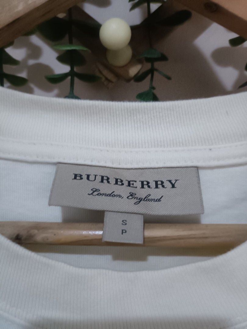 Burberry (Category: Luxury Apparel) located in Sual. Submitted by kriztyne_29 (Listing ID 1471266790, Image 3). Description: dimes: 21*25.5.