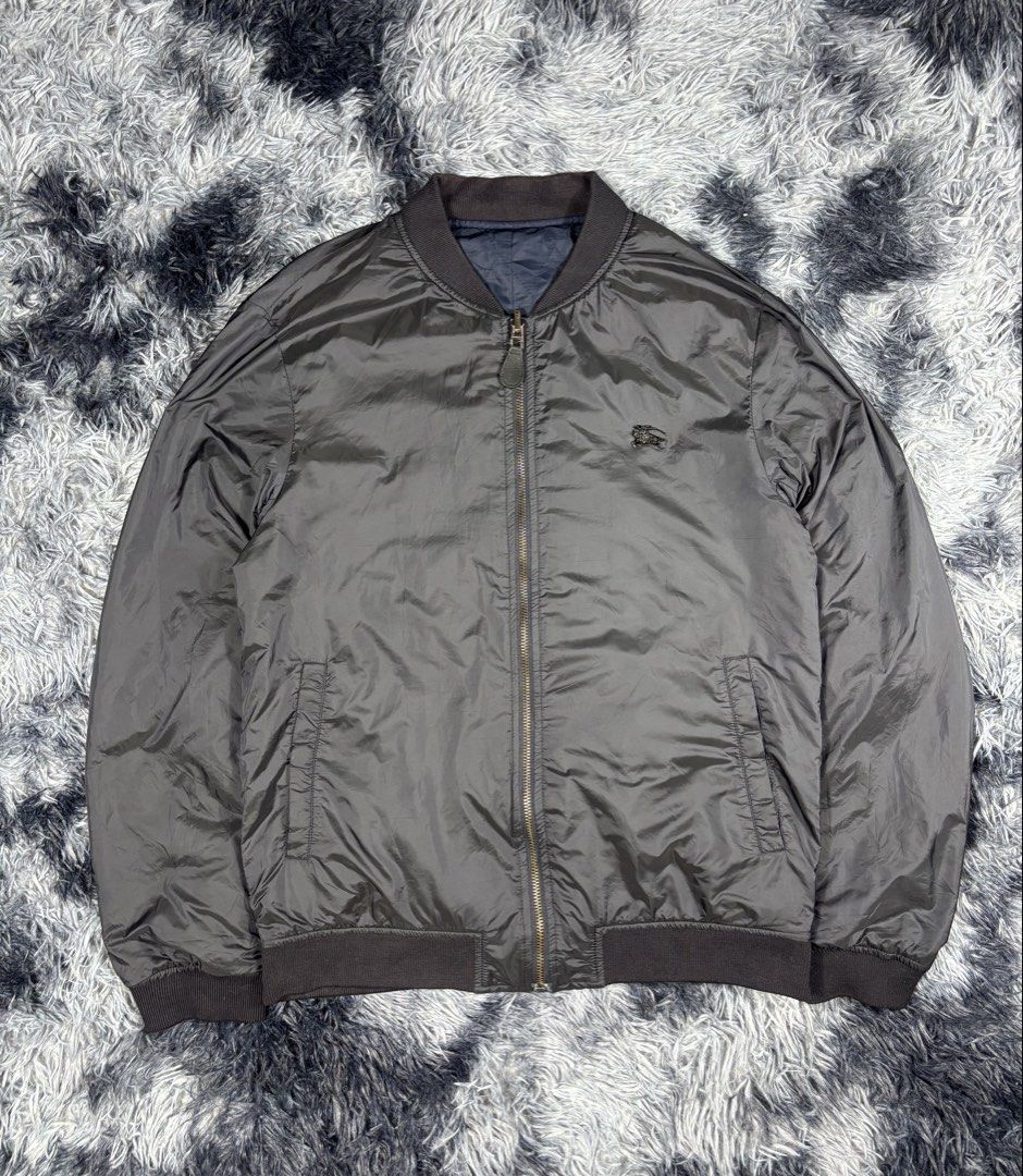 Burberry Bomber Jacket Quilted Reversible (Category: Coats, Jackets and Outerwear) located in Manila. Submitted by south_finds (Listing ID 1471255407, Image 1). Description: Burberry Reversible Jacket Size 48 Good condition Slight fade ribbings .