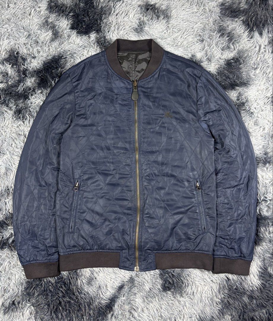 Burberry Bomber Jacket Quilted Reversible (Category: Coats, Jackets and Outerwear) located in Manila. Submitted by south_finds (Listing ID 1471255407, Image 2). Description: Burberry Reversible Jacket Size 48 Good condition Slight fade ribbings .