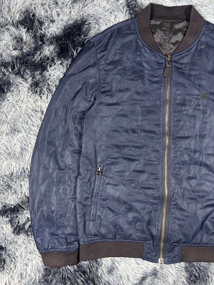 Burberry Bomber Jacket Quilted Reversible (Category: Coats, Jackets and Outerwear) located in Manila. Submitted by south_finds (Listing ID 1471255407, Image 3). Description: Burberry Reversible Jacket Size 48 Good condition Slight fade ribbings .