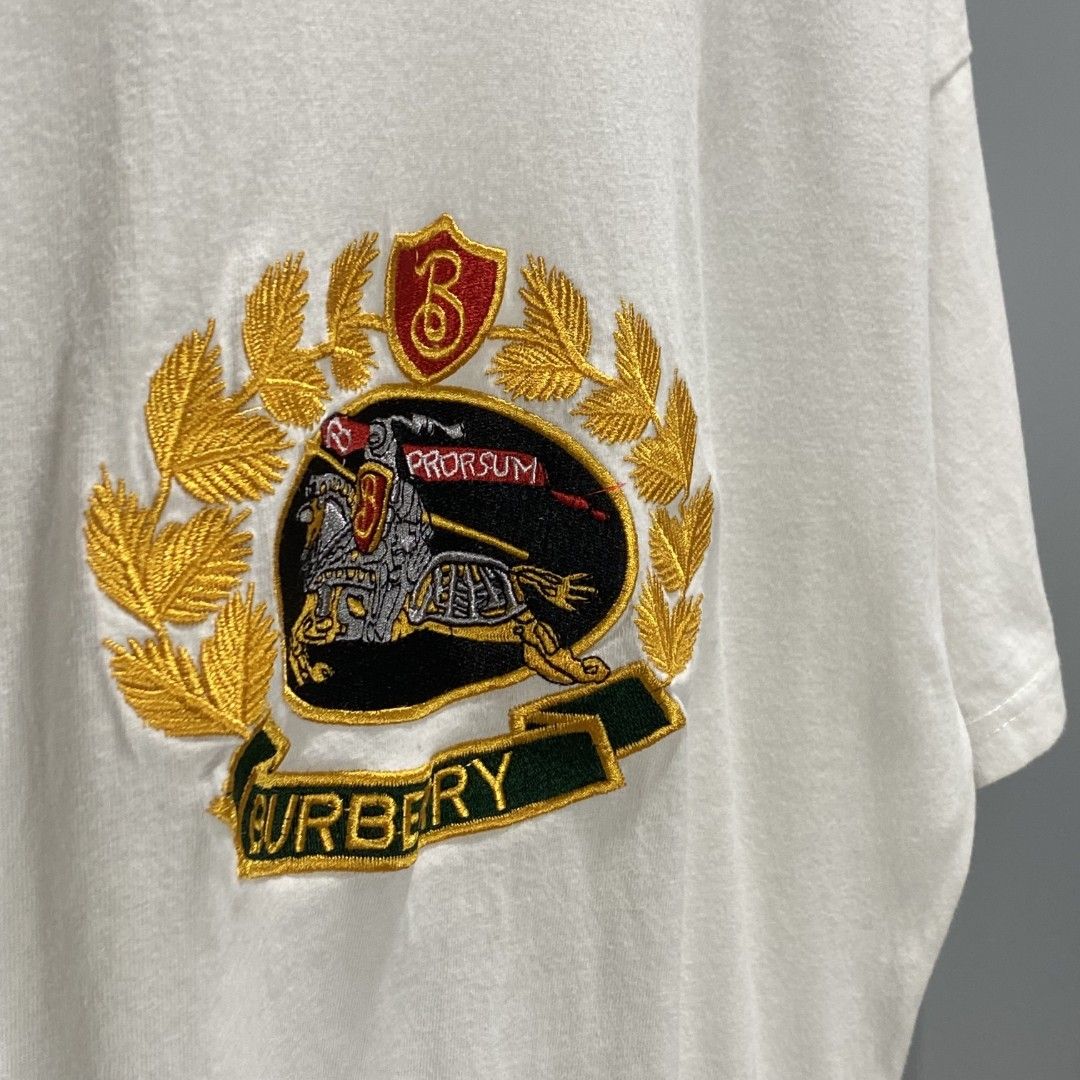 Burberry embroidered (Category: Luxury Apparel) located in Mangaldan. Submitted by kendrops (Listing ID 1471294522, Image 3). Description: Made in Italy Complete tags Width 19.5 Length 26 Medium size Excellent condition: 10/10 Color rate: 10/10 issue:(none).