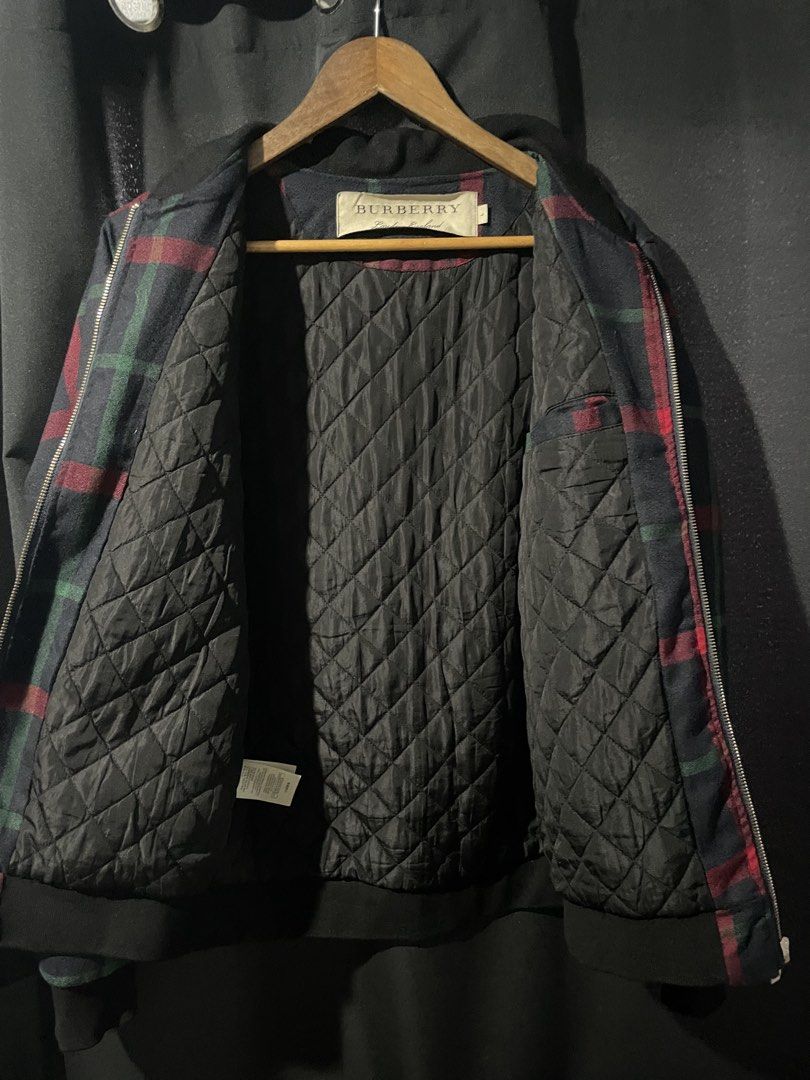 Burberry Vintage Check Wool Blend Bomber Jacket (Category: Coats, Jackets and Outerwear) located in General Mariano Alvarez. Submitted by 4117_thriftnthrive (Listing ID 1471230716, Image 2). Description: In excellent condition No flaws Size: L Measurements Width: 21” Length: 26” .