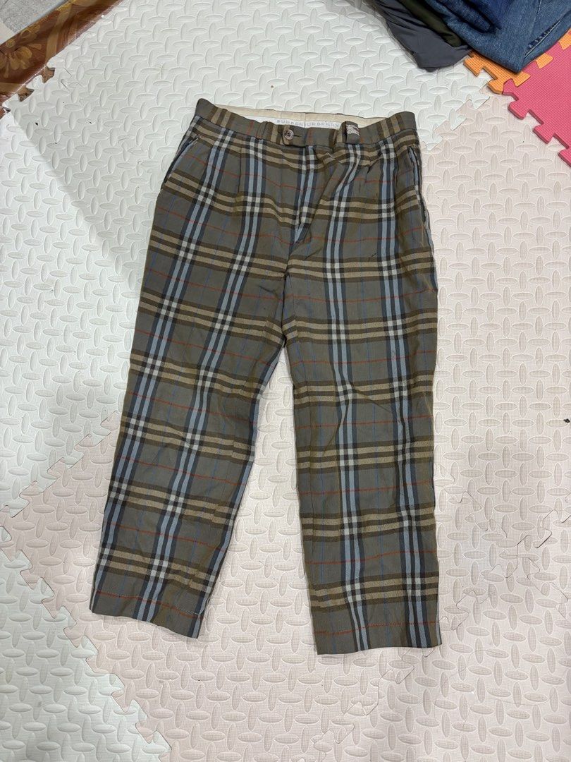 Burberrys Vintage Check Wool Trousers (Category: Trousers) located in Manila. Submitted by noribrahim.20 (Listing ID 1471243744, Image 1). Description: - Brand: Burberrys (Vintage) - Material: 100% Wool with viscose lining - Pattern: Classic green, beige, and blue plaid check - Cut: Traditional tailored fit - Details: Button closure at the back pocket and waistband accent - Care: Dry clean only - Condition: Excellent vintage condition - Perfect f