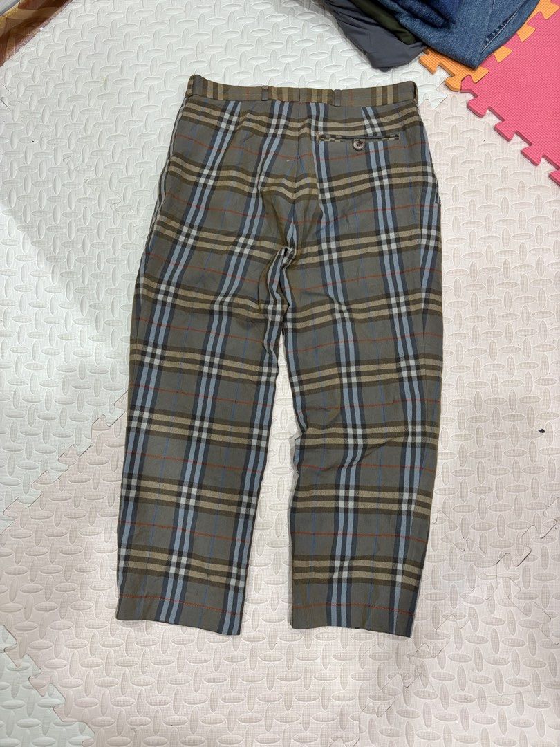 Burberrys Vintage Check Wool Trousers (Category: Trousers) located in Manila. Submitted by noribrahim.20 (Listing ID 1471243744, Image 2). Description: - Brand: Burberrys (Vintage) - Material: 100% Wool with viscose lining - Pattern: Classic green, beige, and blue plaid check - Cut: Traditional tailored fit - Details: Button closure at the back pocket and waistband accent - Care: Dry clean only - Condition: Excellent vintage condition - Perfect f