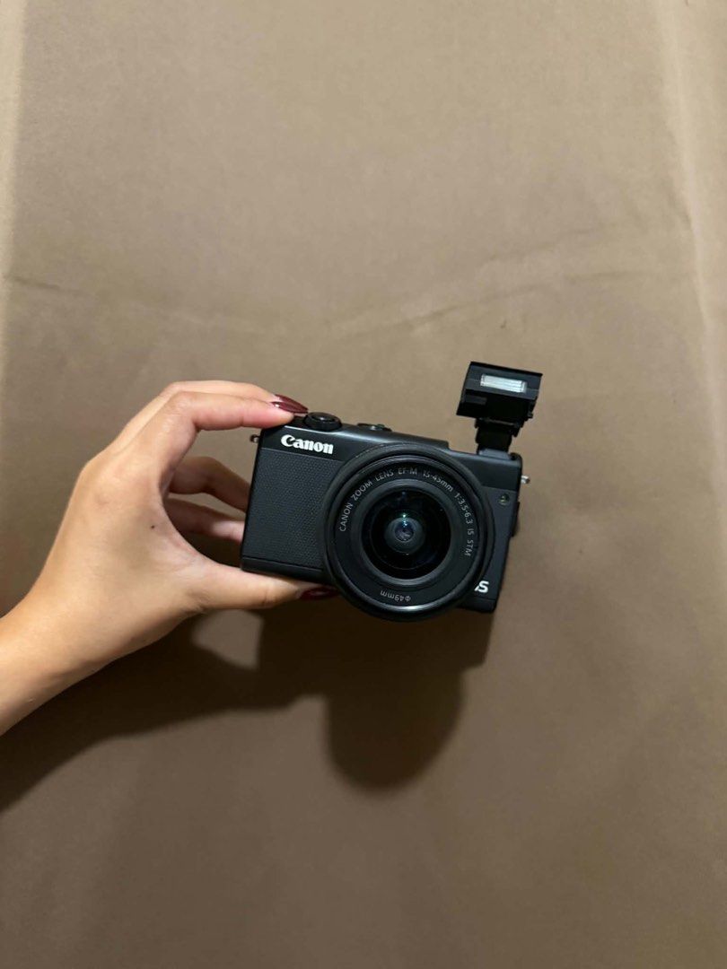 Canon EOS M100 (Category: Cameras) located in Valenzuela. Submitted by lovedeclutterph (Listing ID 1471192500, Image 2). Description: FOR SALE | 2ND HAND CANON EOS M100 with 15-45mm lens and accessoriess Mirrorless Camera Actual photos posted. Ready to use na po 10/10 Performance (No issue) 10/10 Glass 9/10 Cosmetics (In good condition; minimal signs of usage) INCLUSIONS: - CAMERA BAG -1 BATTERY - CHARGER - SD CARD -15-45MM CAMERA LENS.