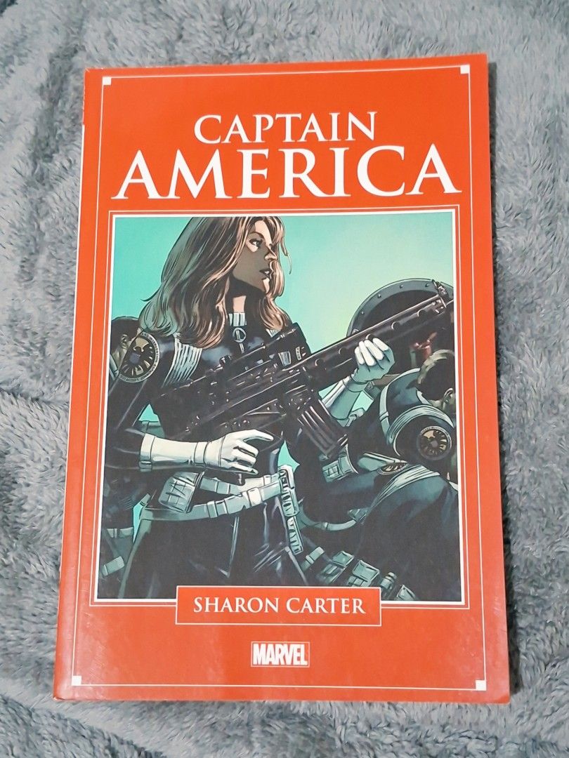 Captain America Sharon Carter Marvel Comic Book (Category: Comics & Manga) located in Pasay City. Submitted by riririju (Listing ID 1471209209, Image 1). Description: - Item: Captain America comic book spotlighting Sharon Carter - Publisher: Marvel - Cover: Iconic orange cover featuring Sharon Carter with a rifle and tactical gear - Format: Standard paperback comic book - Condition: Great addition to any Marvel or Captain America collection - Shi