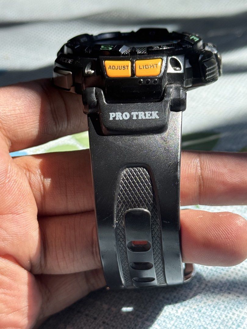 Casio Pro Trek PRG-240 Triple Sensor Watch (Category: Men's Watches) located in Taguig. Submitted by javaninja_xviii (Listing ID 1471229285, Image 2). Description: - Brand/Model: Casio Pro Trek PRG-240 (Module 3246 verified on case back) - Power: Tough Solar (never needs a battery change) - Sensors: Altimeter, Barometer, Compass, and Thermometer - Design: Black resin strap with Pro Trek branding on the keeper, accented with orange front adjust an