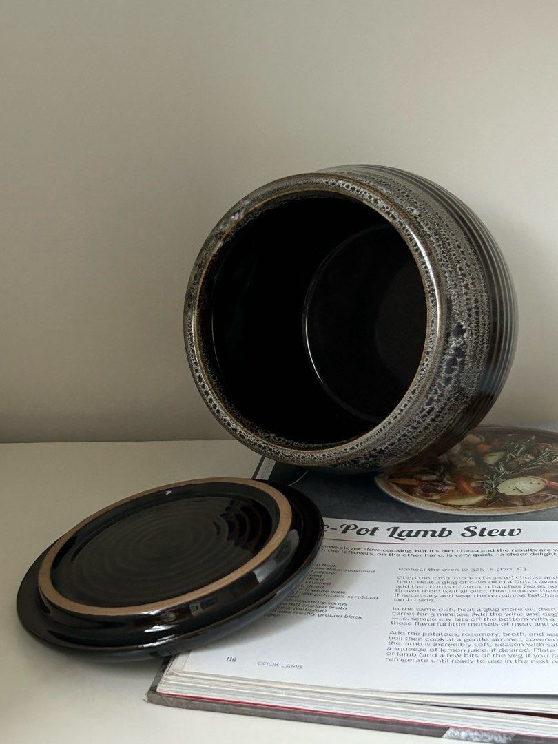 Ceramic Crock / Jar with Lid (1kg Capacity) (Category: Other Kitchenware & Tableware) located in Quezon City. Submitted by curatedfindsy (Listing ID 1471246164, Image 3). Description: Japanese Tenmoku Style Glazed Ceramic Crock / Canister with Lid (1kg Capacity) ₱450 Dimensions: 15.3cm d x 15.3cm h, opening 13.6cm Quality: Excellent Add a touch of rustic craftsmanship to your kitchen or home display with this dark stoneware canister/crock. Featur