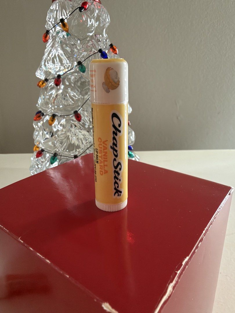 ChapStick Vanilla Custard Lip Balm (Category: Makeup) located in Las Pinas. Submitted by trueflower_125fe9 (Listing ID 1471147897, Image 1). Description: - Brand: ChapStick - Flavor: Vanilla Custard - Size: Standard 0.15 oz twist-up tube - Condition: Brand new, sealed, and flawless packaging - Features: Sweet, delicious scent with a smooth, moisturizing texture - Authenticity: Clear barcode and labeling on the back.