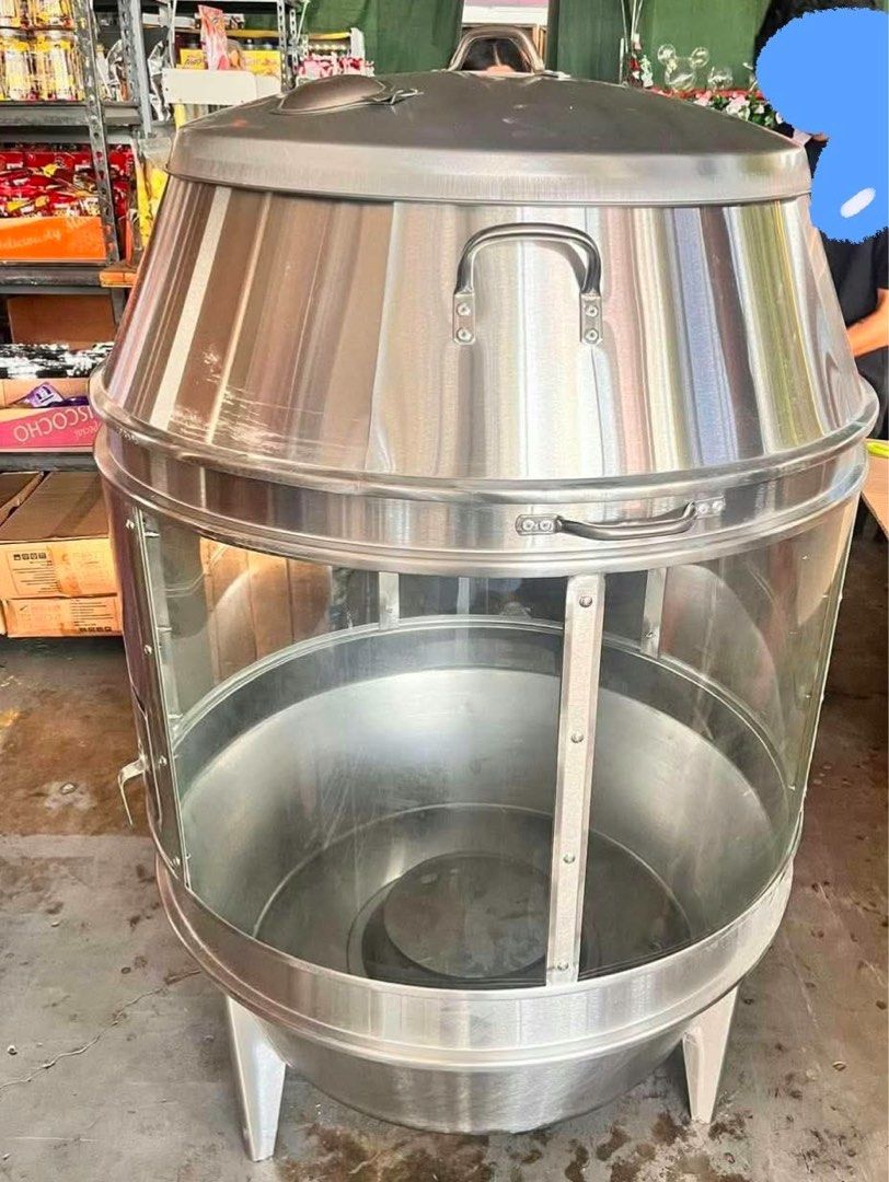Charcoal Oven for Lechon (Category: Ovens & Toasters) located in Cavite. Submitted by marksthetic (Listing ID 1471145048, Image 3). Description: For sale charcoal oven. Good as new! Can be used for lechon manok, liempo, roasted duck - 90cm diameter - Can fit 20-22 chickens.